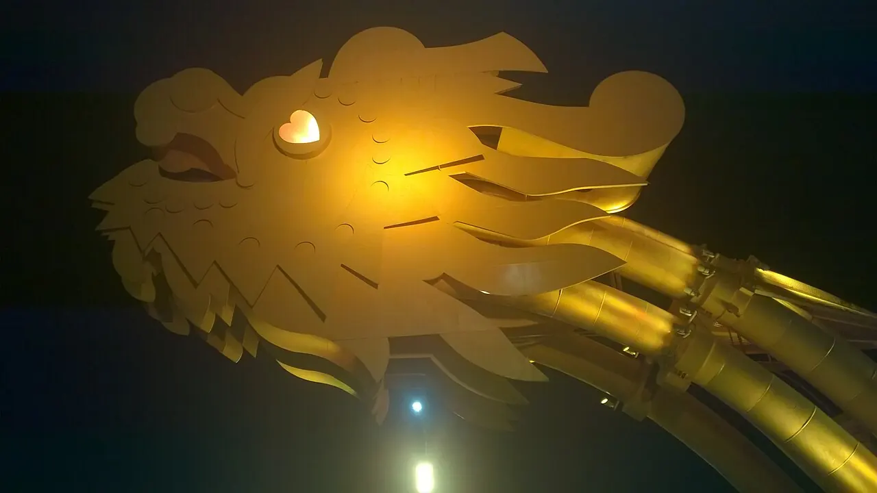 Golden head of Da Nang Dragon Bridge at night